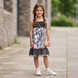 Girl's White and Black Strappy Sundress Wojcik "Uroczy Dzien" with Floral Print, 128