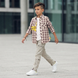 Boys Plaid Long-Sleeve Shirt "Wojcik Jaskinioiec 2" with Yellow Graphic Print, 128